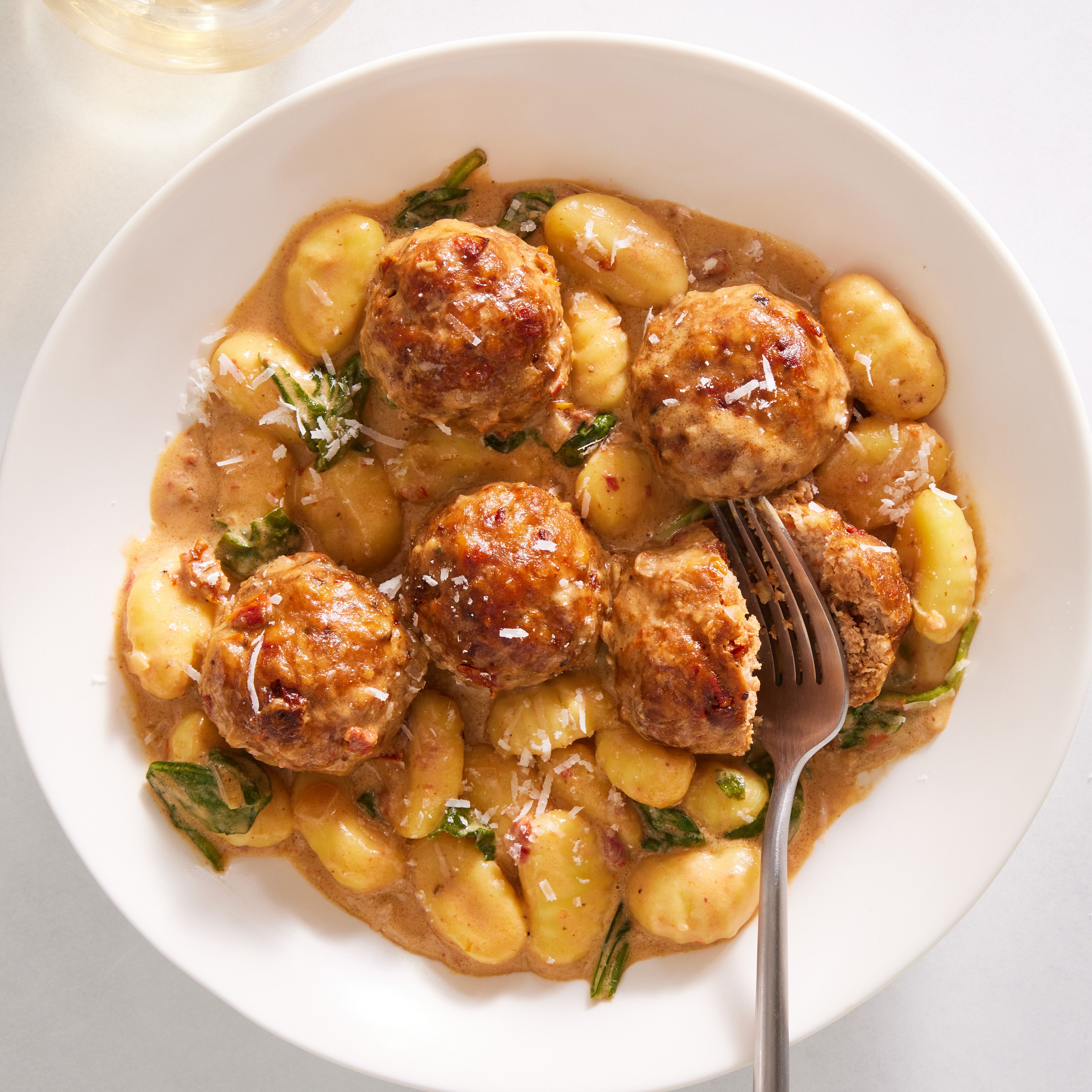 Slow Cooker Tuscan Chicken Meatballs with Gnocchi in Creamy Sauce