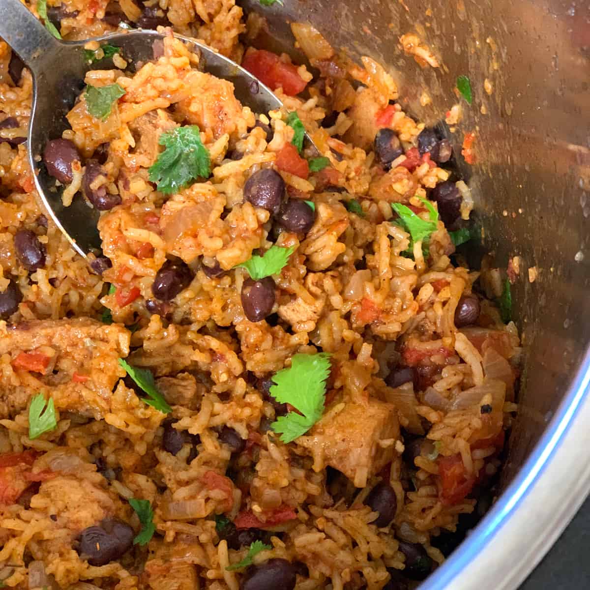 How to Make Perfect Pork with Beans and Rice in One Pan