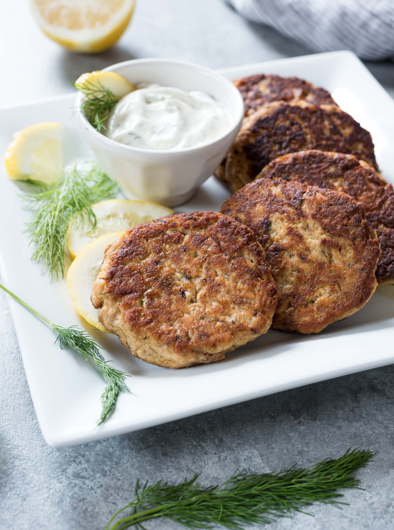 Crispy Salmon Patties with Homemade Dill Sauce for a Flavorful Meal