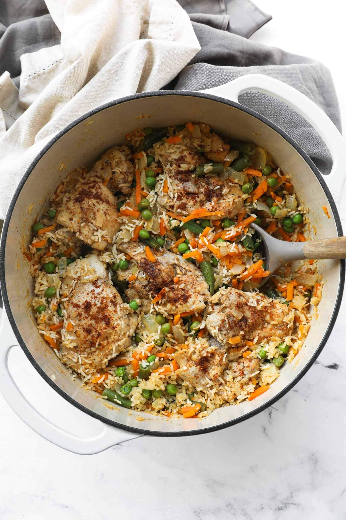 Perfectly Juicy Dutch Oven Chicken Thighs and Rice for Dinner