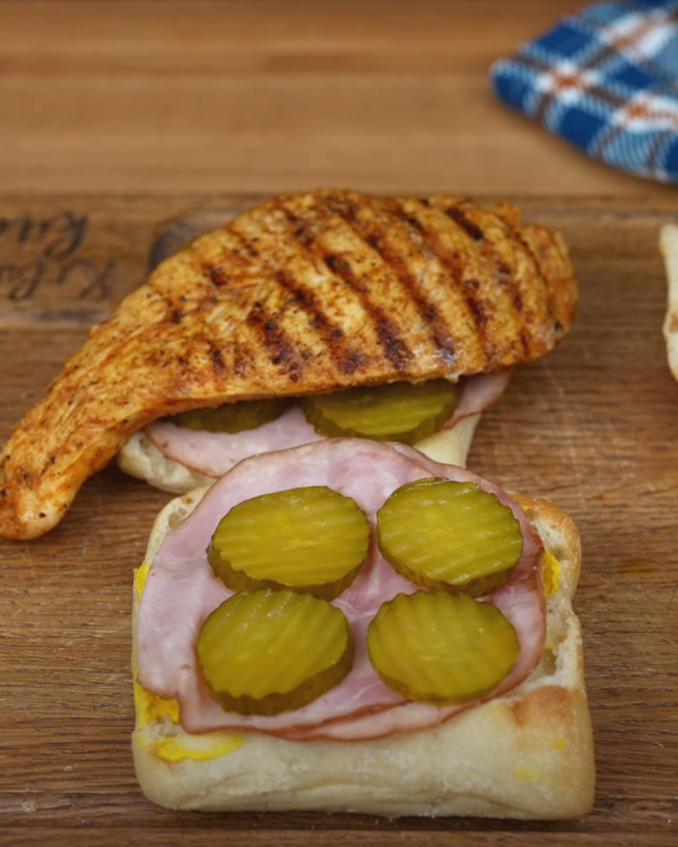 Ultimate Guide to the Cuban Chicken Sandwich: Marinated Chicken, Swiss Cheese & Pickles