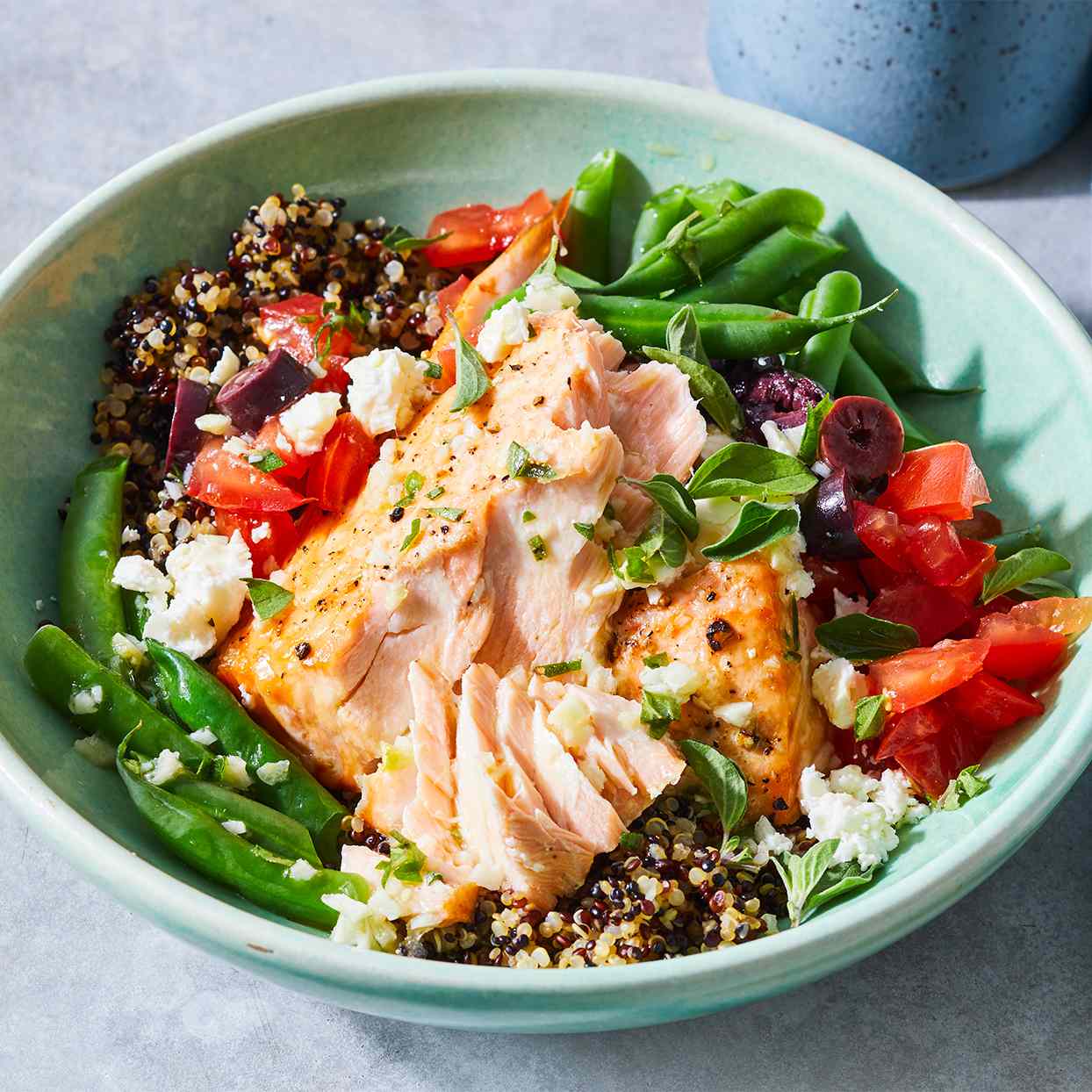 How to Make a Flavorful Salmon Grain Bowl with Quinoa, Rice, and Veggies